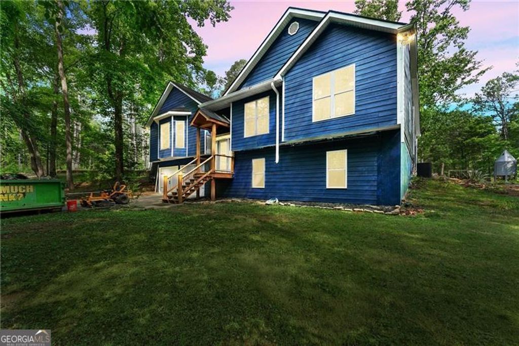 Photo of 7095 Cogburn Road, Cumming, GA 30028 (MLS # 10765277)