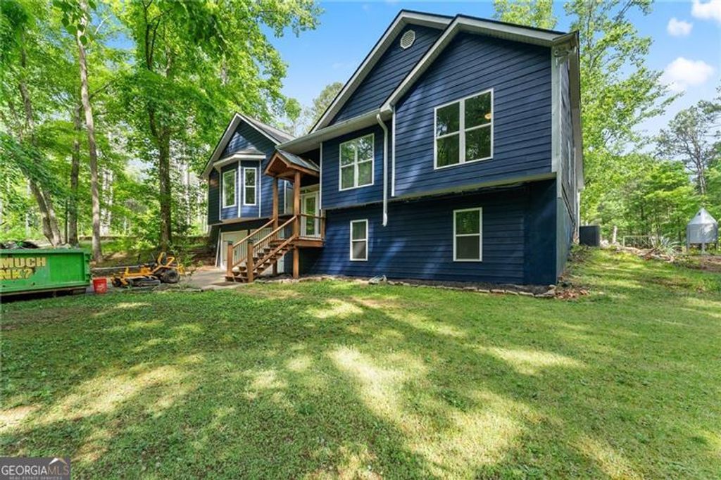 Photo of 7095 Cogburn Road, Cumming, GA 30028 (MLS # 10765277)