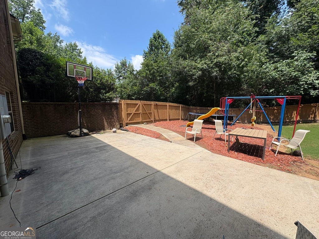 Photo of 180 Village Green Court SW #B, Lilburn, GA 30047 (MLS # 10807362)
