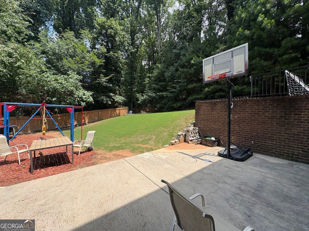 Photo of 180 Village Green Court SW #B, Lilburn, GA 30047 (MLS # 10807362)
