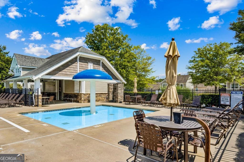 Photo of 312 Woodland Pass, Canton, GA 30114 (MLS # 10803318)