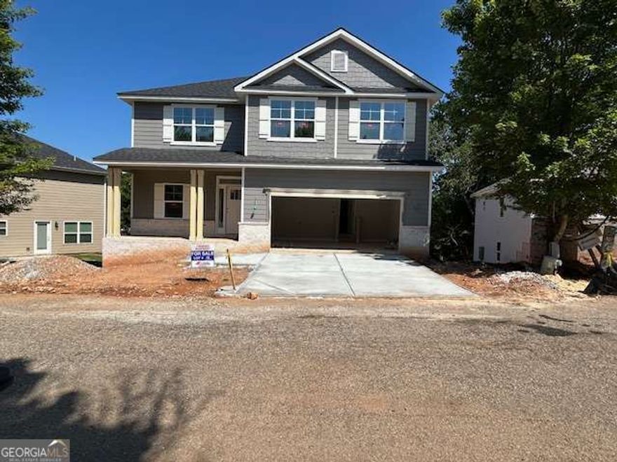 Don't Think You Can Afford New Construction? Think Again!  Stop by today and take advantage of our exciting Fall Savings!  This October our promotions make owning new construction easier than ever. Enjoy limited-time savings on our move-in-ready homes. With thousands in flex cash, closing cost help, and no-payment programs, there's never been a better time to buy new!  Discover over 3,000 sq. ft. of beautifully designed living space in these impressive 5 -bedroom, 31/2-bath homes-crafted with today's families in mind.  Step inside and you'll fall in love with the details:  Designer kitchens with crown-molded cabinetry, soft-close doors, granite/quartz countertops, and elegant pendant lighting.  Luxury vinyl plank flooring through the main living areas, baths, and laundry for both style and durability.  A spacious family room perfect gathering spot.  A private owner's suite offers a relaxing retreat, complete with a large walk-in closet and spa-inspired bath.  Upstairs bedrooms provide plenty of flexibility for family, guests, or a home office.  The finished basement extends your lifestyle with an additional bedroom, full bath, and large recreation area-ideal for entertaining or quiet nights in.  Set in a peaceful North Georgia community, these homes blend timeless Southern charm with modern features and unbeatable value.  Visit us this season and see just how affordable new construction can be!