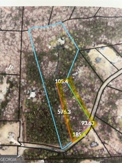 Approximately 2 acres of land for sale on a quiet street located only minutes from Lake Allatoona and Red Top Mountain State Park. This area is an up-and-coming part of Bartow County and is convenient to I-75, a short drive to Lakepoint Sports Complex, about 20 minutes to The Outlet Shoppes of Atlanta in Woodstock, and 9 minutes to Bass Pro Shops. This lot is part of a larger parcel and will be surveyed and split upon acceptable contract. Renderings in photo are approximate and seller is open to discuss lot lines with potential buyer. Please do not enter driveway of home next to lot, lot can be easily accessed from Rock Ridge Road. Look for Blue Maximum One sign on left side of road once you turn on Rock Ridge Road. Seller is open to discussing owner financing.