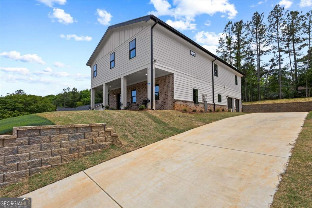 Photo of 6852 Silver Maple Dr, Rex, GA 30273 (MLS # 10761462)