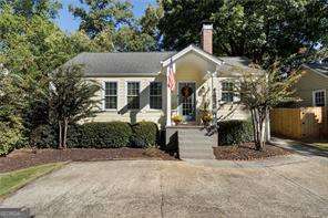 The one you've been waiting for - an updated ranch with two living spaces, an oversized primary suite, a dedicated office space and a spacious outdoor entertaining porch. You'll walk into the light-filled formal living space with original mantle. A dedicated dining space allows for easy entertaining. The kitchen has been updated with newer cabinetry plus lots of storage space, and views to the spacious fireside family room. The primary suite features vaulted ceilings and tons of natural light - step inside the en-suite bathroom and see the recent updates including two closets (one is a walk in closet with newer closet system), two sinks in the vanity, and updated shower. A dedicated office space or peloton room are located off of the primary bath. Guests will enjoy a separate bedroom and wallpapered hall bathroom. Recent updates include the primary bath renovation, new HVAC (2024), new washer and dryer (2025), french drain installed in backyard, and new gas logs in family room fireplace with tiled surround (2023). Enjoy plenty of off-street parking with space to turn around in the driveway! Conveniently located near Atlanta's popular westside, The Grove, Monday Night Brewery, The Works shops/ restaurants, and easy interstate access!