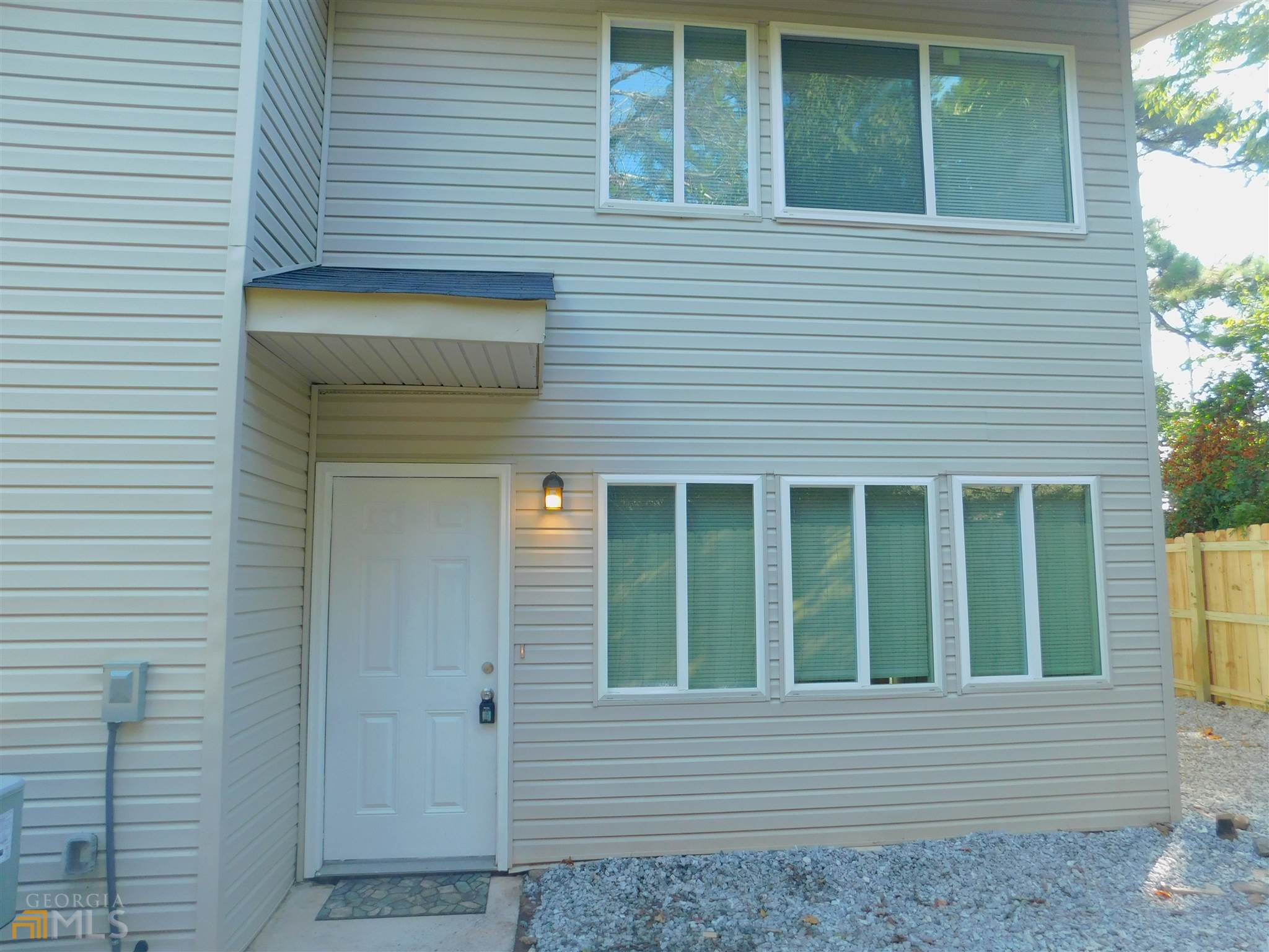 Nice Three Bedrooms Two and a Half Bathroom Townhouse for Rent!! Updated interior and exterior . Water included . Conveniently located , private fenced yard.