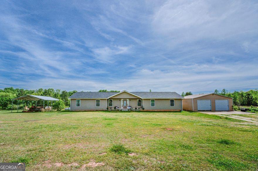 HIGHLY MOTIVATED SELLER. 34+ acres of privacy. Home sits 1200+ ft off of the main road. This property has it all -  pasture, creek, and hardwoods! The home includes 3 beds / 3 full baths with two primary bedrooms. Open living room and kitchen with commercial grade gas stove. Full unfinished basement with ample storage space. Also negotiable is 2021 Massey Ferguson 45 Hp tractor with 29 hours, 6' bucket, 6' bush hog, and trailer.  Call to schedule your showing today!