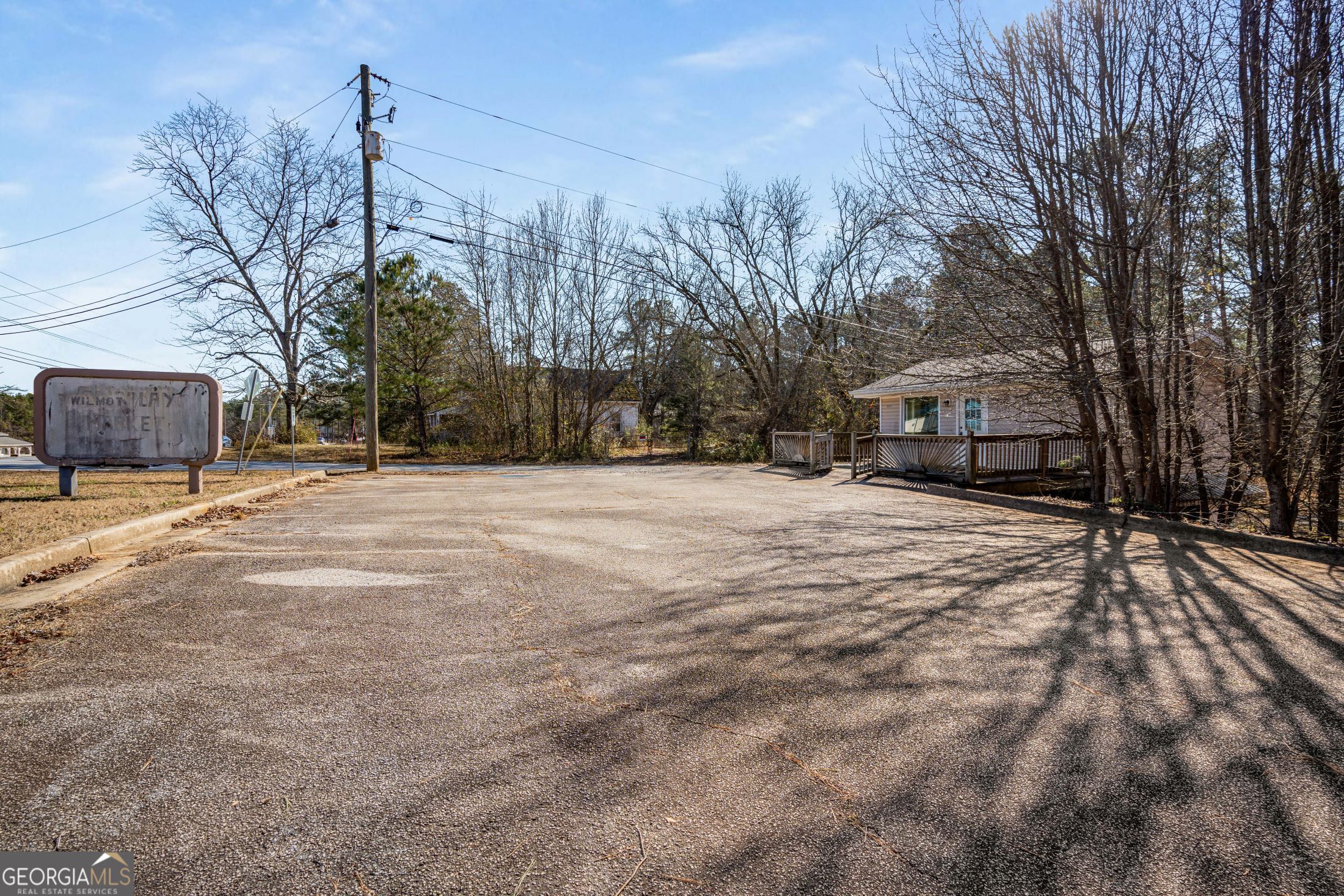 Prime commercial opportunity in the heart of Douglas County! This property features 1.23 acres of level, buildable land with a 400 sq. ft. structure, perfect for use as an office or retail space. This site offers exceptional visibility, accessibility, and versatility for a variety of business ventures. Whether you're an entrepreneur looking to expand or an investor seeking a valuable asset, this property is ready to meet your needs. Flexible zoning to support a wide array of commercial uses or rezoning for residential use (confirm specifics with Douglas County). Water, electricity, and other essential utilities are available on-site for seamless development. The property offers ample parking and a huge lot for expansion or new construction, making it ideal for entrepreneurs or investors looking to establish or grow their business. With high visibility along Highway 166 and easy access to I-20, this property is perfectly positioned to serve the thriving Douglasville Community. Whether you're considering retail, office, medical, or other commercial ventures, the flexibility and potential of this property are unmatched. Don't miss this opportunity to own a versatile property in a high-traffic area.