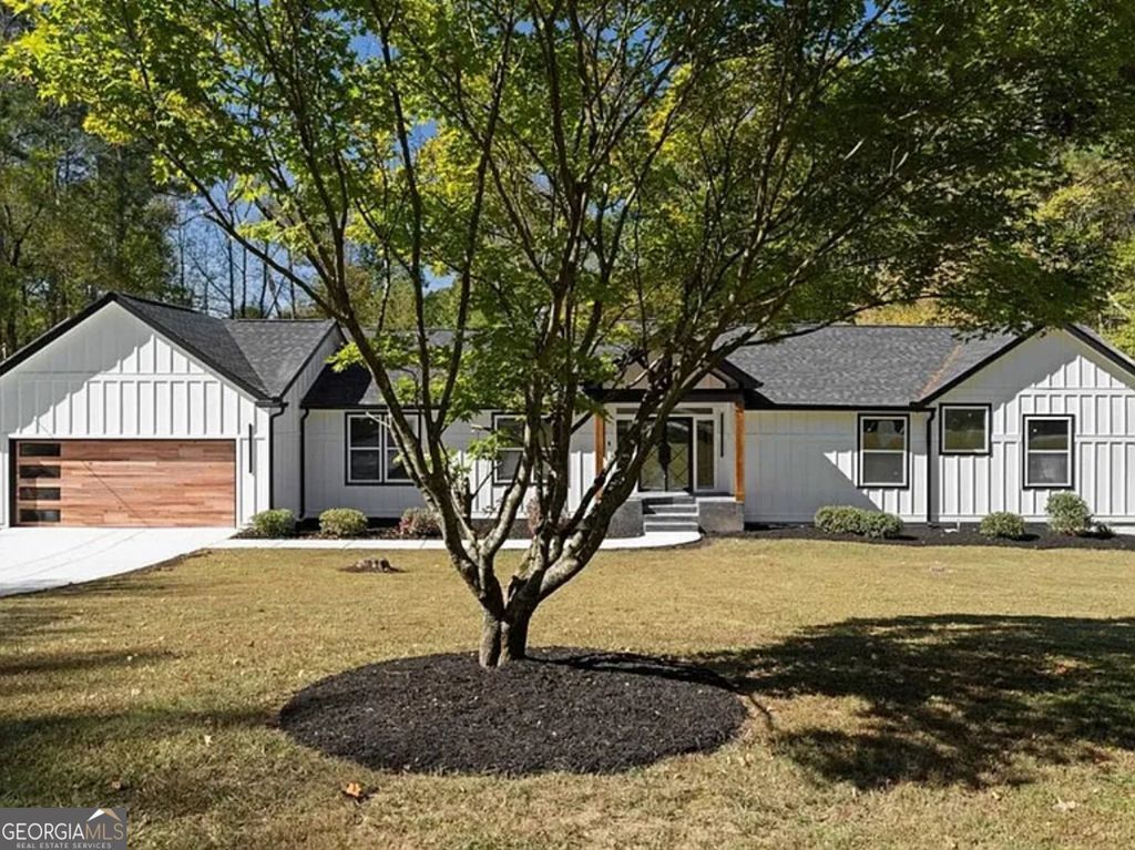 Photo of 7530 Spalding Lane, Atlanta, GA 30350 (MLS # 10758212)
