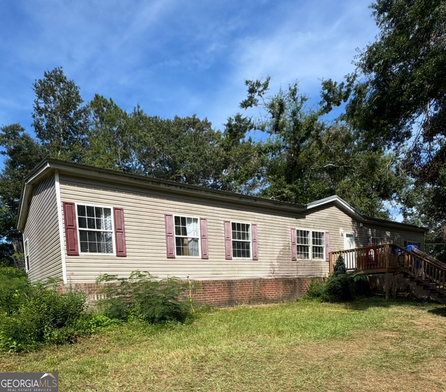 Investor Special!  This 4-bedroom, 2-bath mobile home sits on 1.88 acres and features a spacious floor plan with a private master suite separate from the additional bedrooms. A new roof was installed in June 2024, adding peace of mind for the next owner. The property is being sold as-is and is currently tenant-occupied with a strong rental history, making it a great investment opportunity. Please allow 24 hours' notice for showings.