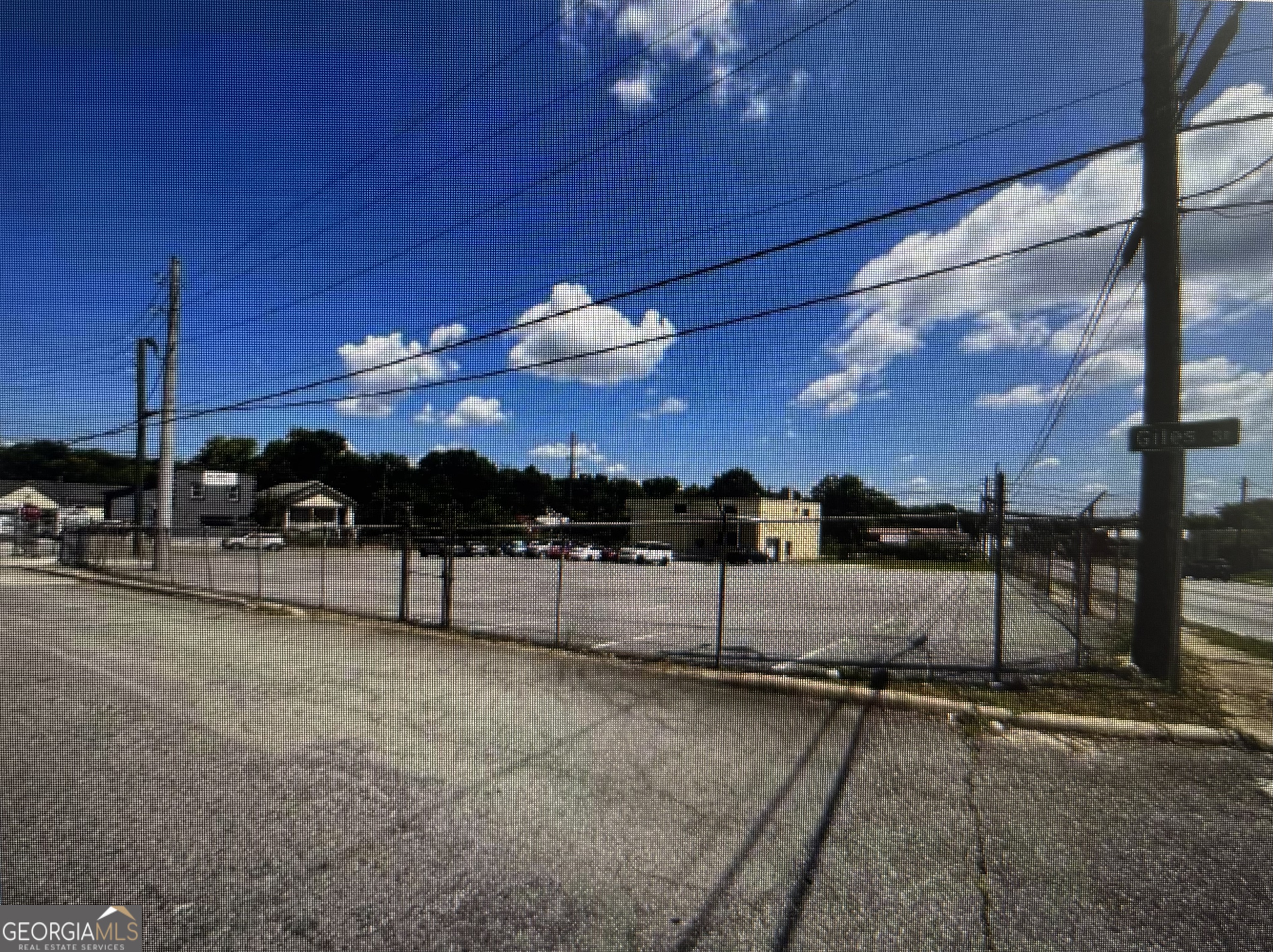 4,200 square feet of versatile warehouse space, ideal for a variety of commercial uses including warehousing, retail, or auto repair. The building features four private offices, multiple storage areas, and one-half bath, providing a functional layout suitable for a range of business operations. The facility includes two bays with overhead doors and a convenient loading dock for easy shipping and receiving. Exterior amenities include yard space, ample common-area parking, and a secured perimeter enclosed by an electric fence with surveillance provided by security cameras. Located in a high-traffic area near a hospital, numerous restaurants, and retail businesses, this property offers exceptional visibility and access, making it an ideal location for businesses seeking a strategic and secure operational base.