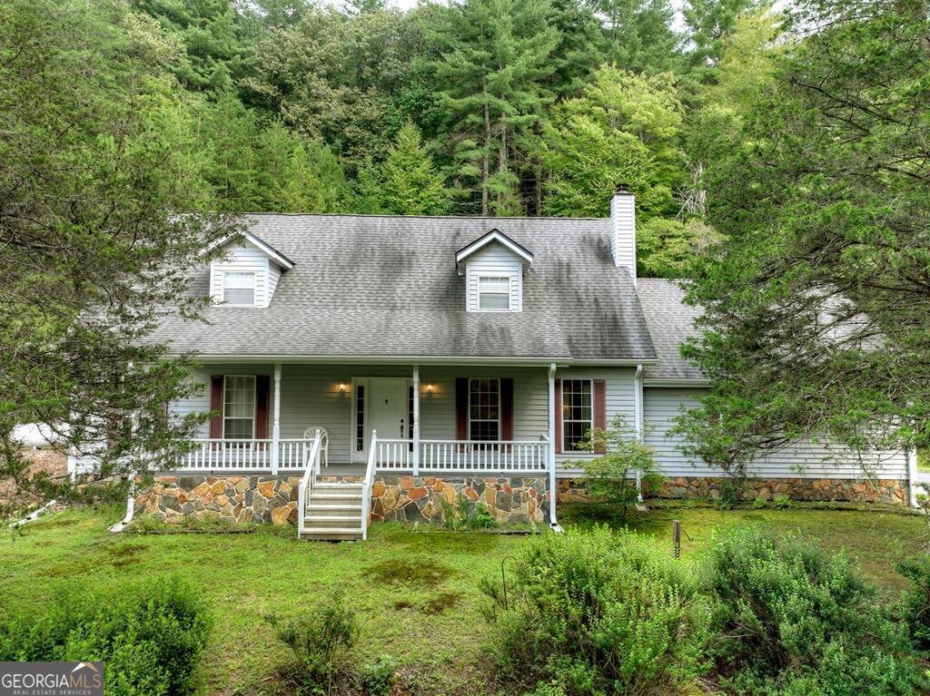 LOCATION, LOCATION, LOCATION!!!!FIRST TIME ON THE MARKET!! This property is a EXCEPTIONAL opportunity for anyone looking for a mountain getaway or a real estate investment and also conveniently located between BLUE RIDGE and ELLIJAY! This 4BD/2BA home , 2 car carport with full unfinished basement on 15.11 ACRES has so much to offer. Home would make an incredible remodel but is also move in ready and in excellent condition. Spacious kitchen, dining room and living room with real wood fireplace. Walking distance to the famous " Pink Pig Restaurant" and other favorite attractions including the " Expedition Bigfoot The Sasquatch Museum", "Falls Branch Falls" With its prime location, natural beauty, this property is sure to attract alot of interest from potential buyers!!!