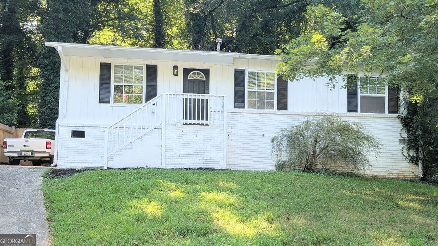 Beautifully renovated 3-bedroom, 1.5-bath home in the growing Lakewood Heights area of Atlanta (30315). This move-in ready ranch  features an open floor plan with original hardwood floors, an updated kitchen with stainless-steel appliances, modern cabinetry, and clean  finishes. The bathrooms have been upgraded with new vanities and fixtures, creating a bright, modern look throughout. A brand-new deck opens to a large, fenced backyard-ideal for entertaining, pets, or future expansion. Major systems updated for peace of mind. Convenient location minutes from Downtown Atlanta, the BeltLine, Lakewood Amphitheatre, Grant Park, and Hartsfield-Jackson Airport.
