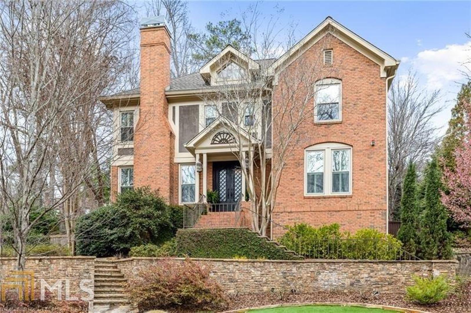 Discover this extraordinary home in sought-after Morningside neighborhood on a quiet cul-de-sac street. The seller spared no expense in designer wall coverings, fixtures & appliances in this inviting home with an open-floorplan. This home boasts hardwood floors & extravagant custom-made iron front doors, granite & marble countertops, designer lighting, 2 fireplaces and an integrated sound system. The main-level Chef's kitchen will wow everyone with its Sub-Zero refrigerator, a double oven, Thermador five burner gas cooktop, KitchenAid ice maker & Dry Bar area. This home offers an oversized master bedroom with sitting area & bookcase. Master bath with marble throughout, corner spa tub, steam shower with rain dome and his and hers mahogany vanities. The vestibule between bath and walk-in closet has a built-ins and morning kitchen. Au-pair suite with a full kitchen, bed and bath, separate laundry room and its own exterior entry. Landscaping includes artificial turf, extensive lighting, stone flower-bed borders, irrigation throughout & 2 car garage. Enjoy a private beautiful walk-out back yard with stonework, fountain, and fire pit. This home is ideal for entertaining with an open and inviting flow throughout the interior and exterior spaces. Conveniently located close to Piedmont Park, the Atlanta BeltLine, Atlanta Botanical Gardens and all the popular Atlanta dining and entertainment spots. Easy access to I-85, I-75, & Airport. Come enjoy everything Intown and Morningside has to offer.