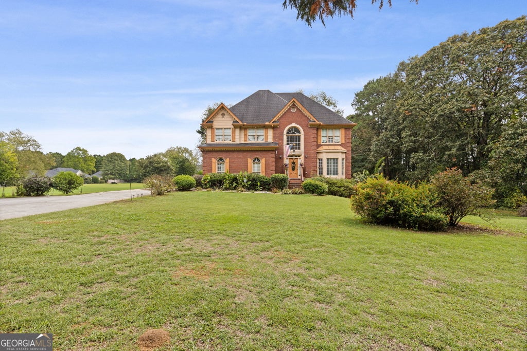 Photo of 605 Ozora Road, Loganville, GA 30052 (MLS # 10853682)