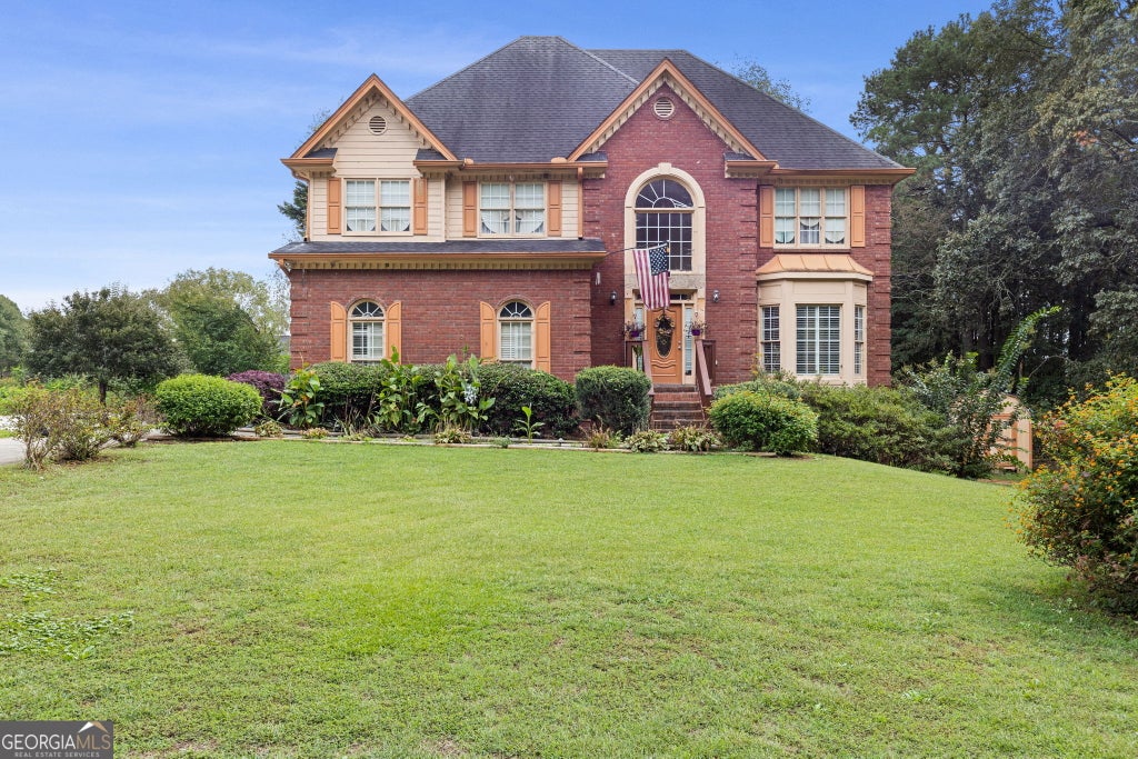 Photo of 605 Ozora Road, Loganville, GA 30052 (MLS # 10853682)