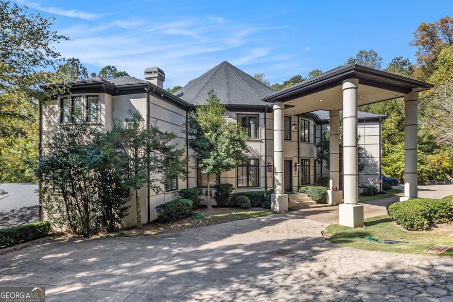The home of your dreams awaits you! Discover this prestigious gem. Nestled in the highly desirable Country Club of the South, this residential property has it all. A residence of considerable unique scale, it presents an amazing opportunity to craft an environment perfectly suited to individual aspirations. This home offers plentiful private retreats, each a sanctuary for rest and rejuvenation. This home ensure that convenience and privacy are paramount, allowing for effortless daily routines, where sophistication meets lifestyle. This one of a kind estate features brand-new flooring. Stunning modern chandeliers throughout the home. Designed with a Savaria panoramic glass home elevator with round views, making your living conditions that much simpler. Consider how much easier it would be to eliminate the physical fatigue associated with using stairs, making movement between floors smoother and less strenuous. A chef inspired gourmet kitchen with a large island and plenty of cabinet space, Wolf premium stainless steel appliances, Wolf gas cooktop, Wolf double ovens, A stunning designer backsplash and statement chandelier light fixtures that brings a touch of elegance. This kitchen is perfect for hosting, gathering and entertaining. The kitchen opens to the living area with high ceilings and large windows that allows for plenty of natural light. On the top level step into a breathtaking oversized primary bedroom that redefines luxury living. Soaring ceilings with glass design that invites natural light and a vibrant look. At the heart of the room, a sleek modern fireplace that adds warmth and ambiance for cozy evenings. A true sanctuary designed to inspire and unwind. The interior spaces present a canvas for inspired living with each bedroom styled to create the dreamiest escape. Consider the possibilities for grand entertaining or quiet moments of relaxation; here, every square foot invites personalization and purpose. The terrace level features a walk-in customized glamorous closet designed for style and function, bringing the store feel home. Entertain in style with a sleek and functional wet bar. A Indoor full basketball court with wooden floor. Enjoy a game of hoops with family or friends 365 days of the year, everyday play and unforgettable moments. A professional recording studio, whether you're a content creator , artist, musician, or remote professional this dedicated space provides a retreat to create. Experience cinematic comfort in the media room, with tiered seating, this space is perfect for movie night with family and friends.  A finished terrace-level that functions as a seamless extension of the main home. This property offers a solid foundation for creating a timeless masterpiece with the ones you love. Make room for your growing car collection, with a 10-car garage to display your classic cars. Country Club of the South is a premier golf community located in North Fulton County within the city of Johns Creek. The community consists of 735 updated and distinctive homes. Amenities to include 5 tennis courts, 4 pickleball courts, 1 Jr. olympic pool,1 zero entry kiddie splash area, 2 playgrounds, 2 basketball courts and a beautiful Rec Center, 24/7 gated security. The lifestyle you've been looking for! Wait no longer. This stunning estate has everything you can dream of and more.