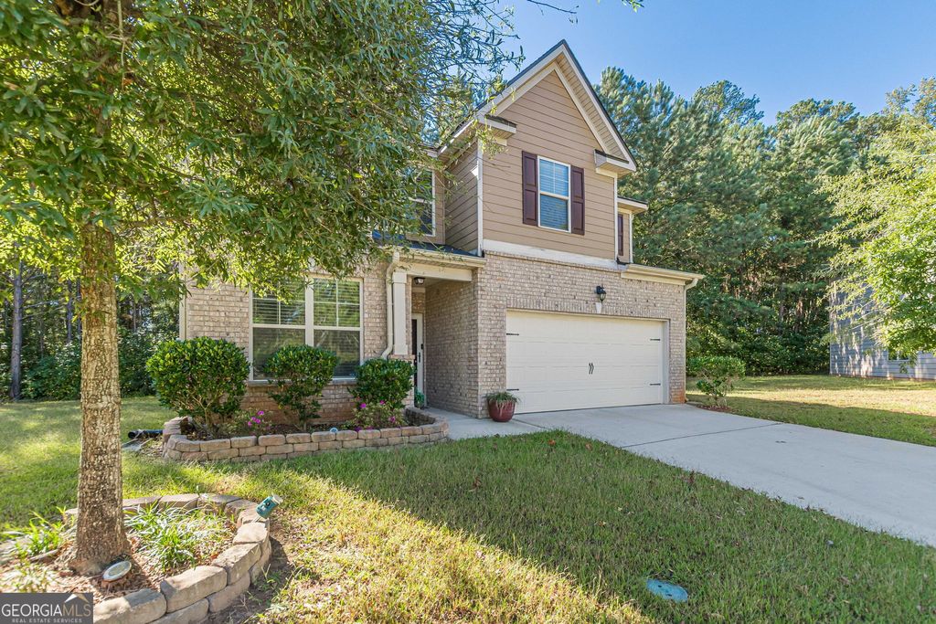 Photo of 550 Offaly Lane, Atlanta, GA 30349 (MLS # 10625806)