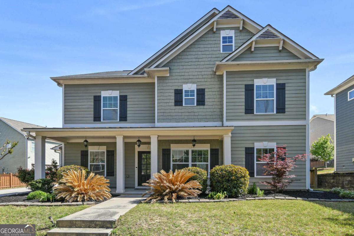 Discover your dream home nestled in the vibrant heart of Atlanta and offered by the Original Owner! This exquisite 3-bedroom, 2.5 bathroom residence features an open floor plan, perfect for contemporary living and entertaining. The expansive living area, bathed in natural light, includes a charming fireplace. The spacious kitchen is a culinary haven, complete with elegant granite countertops, a gas range, abundant counter space and modern appliances. Upstairs, you'll find three generously proportioned bedrooms. The owner's suite includes an ensuite bath and a spacious custom closet. The fenced, flat backyard serves as an ideal outdoor retreat for entertaining and relaxation, with plenty of space for gardening and play. A two-car side garage offers convenient parking and storage, while the corner lot enhances privacy and curb appeal. This home has been thoughtfully updated in 2023 with fresh paint, a new HVAC system, and new flooring, ensuring it's move-in ready. Perfectly located near midtown Atlanta, it offers easy access to shopping, dining, and entertainment while providing a tranquil escape in a bustling urban environment. Plus, the community boasts a brand new, amazing pool for your enjoyment!