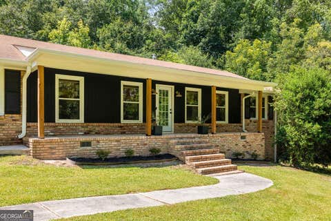 Photo of 5925 Old Bill Cook Road SW, Atlanta, GA 30349 (MLS # 10801006)