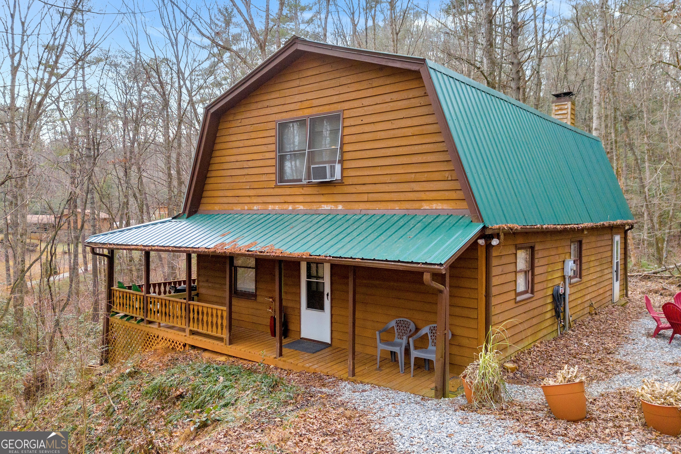 PRICE IMPROVEMENT! Nestled in the picturesque Bavarian Alpine Village of Helen, Georgia, this cozy cabin offers the perfect mountain retreat and explore the scenic Chattahoochee River. Surrounded by natural beauty, it's an ideal spot to relax and unwind. Enjoy the serenity of the outdoors on the spacious covered porch or gather around the firepit with friends and family while soaking in the crisp Georgia air. When adventure calls, take a short trip into town to explore Helen's vibrant attractions, including unique restaurants, quaint shops, a thrilling roller coaster, tubing adventures, and year-round festivities and holiday celebrations. This charming home boasts 3 bedrooms, 2.5 bathrooms, a fully-equipped kitchen, a dining area, and a cozy family room complete with a wood-burning stove. The circular driveway provides ample parking, ensuring convenience for you and your guests. Whether you're seeking a full-time residence, a part-time getaway, or a lucrative short-term vacation rental, this property fits the bill perfectly. Don't miss out on the chance to own your piece of the North Georgia Mountains and experience all the charm Helen has to offer! Being sold partially furnished and will convey with the sale (also excludes some personal items of the seller). Gravel driveway has been graded. MOTIVATED SELLER!