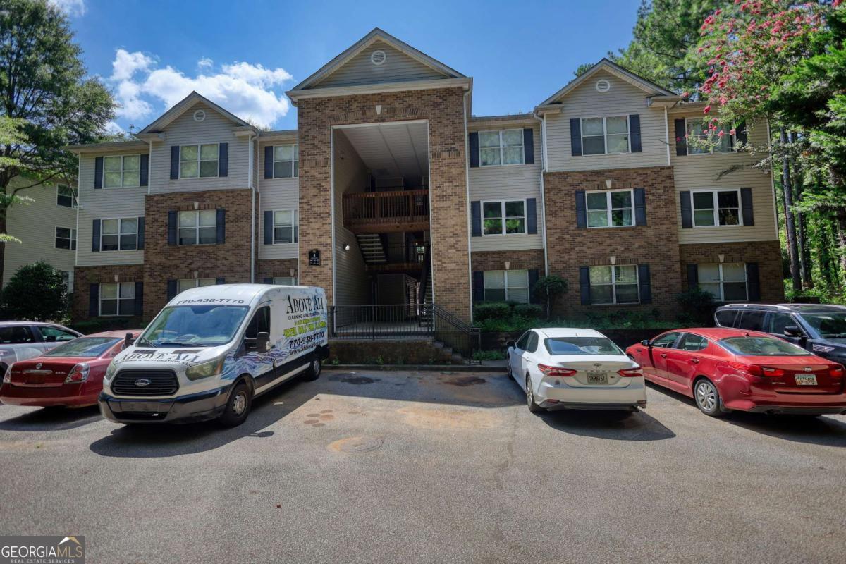 Upgraded 3BR/2BA Condo - Move-In Ready with New Systems! This beautifully upgraded 3-bedroom, 2-bath condominium stands out in the community with its modern finishes, thoughtful updates, and spacious layout. Featuring a newer water heater, brand-new HVAC heat pump, new electric range, over-the-range microwave, and new kitchen cabinets, this home offers both style and peace of mind. The kitchen flows seamlessly into the dining area and open-concept living room, all finished in a contemporary, neutral color palette that suits any style. The spacious primary suite includes a private en suite bathroom and a walk-in closet. Two additional bedrooms offer flexibility for guests, office space, or a growing family, along with a full guest bathroom. Enjoy the convenience of an outdoor storage unit, perfect for keeping things organized. Located just minutes from MARTA, I-20, I-285, and Stonecrest Mall, this home is ideal for commuters and those who love to be close to shopping, dining, and entertainment. Whether you're looking for a comfortable personal residence or a smart investment, this property is a fantastic opportunity - the community is investor-friendly with leasing permits available! Seller is motivated and seeking a quick close - don't miss out!