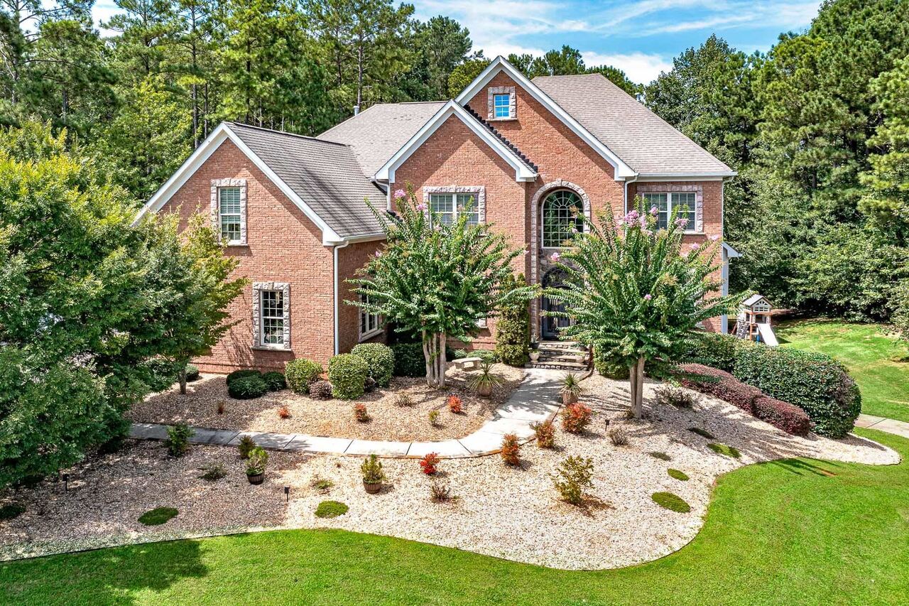 This house is one of the rare find in the exclusive gated Eagles landing country club community. This is one of the only few homes that is almost a true 4-story house including the basement. Chefs Kitchen with high end Viking appliances, hardwood floors everywhere. Extra large Primary bedroom with a hugest closet that you would have ever seen, all the bedrooms with bathrooms. Full finished basement with same details and high end Viking appliances in the basement kitchen. Open floor plan with plenty of room to entertain. House is located on a culdesac in an Estate Section of the neighborhood that has 1 acre lots, plenty of room to install a pool. Dont let the house size from outside fool you. 3 car side entry garage, full brick with tons of bells and whistles. This will check mark all your boxes on your Wishlist.
