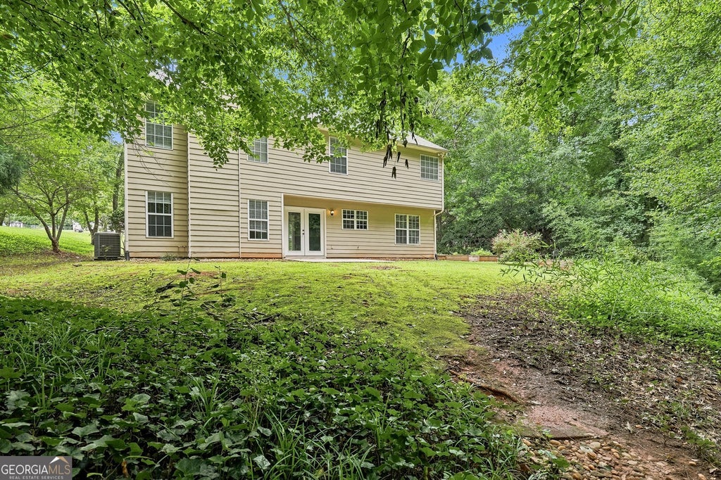 Photo of 6425 Raleigh Street, Cumming, GA 30040 (MLS # 10813342)