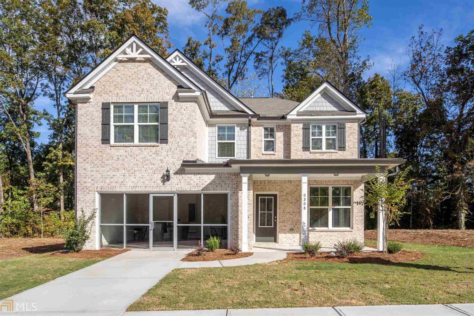 Wynbrooke floorplan at Phillips Trace is a homeowner's dream come true! Gorgeous hardwoods in extended foyer lead to formal dining room that could also be used as a home office! Spacious kitchen boasts granite counters, ample cabinetry, recessed lighting, and comfortable breakfast area! Cozy family room with fireplace is great for relaxing and entertaining. Huge owner's suite is fit for royalty with its unique vaulted ceiling, spa-like bath w/ dual vanity & oversized walk-in closet! Side entry garage amps up the curb appeal and will leave your guests in awe.