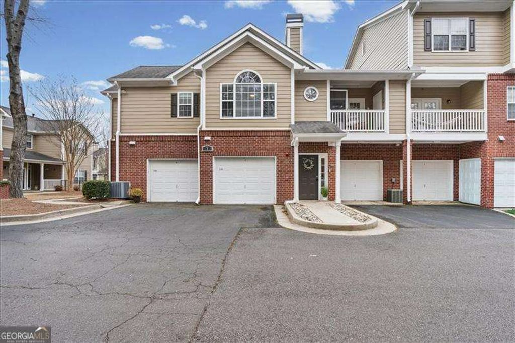 Photo of 7104 Woodland Lane, Alpharetta, GA 30009 (MLS # 10717753)