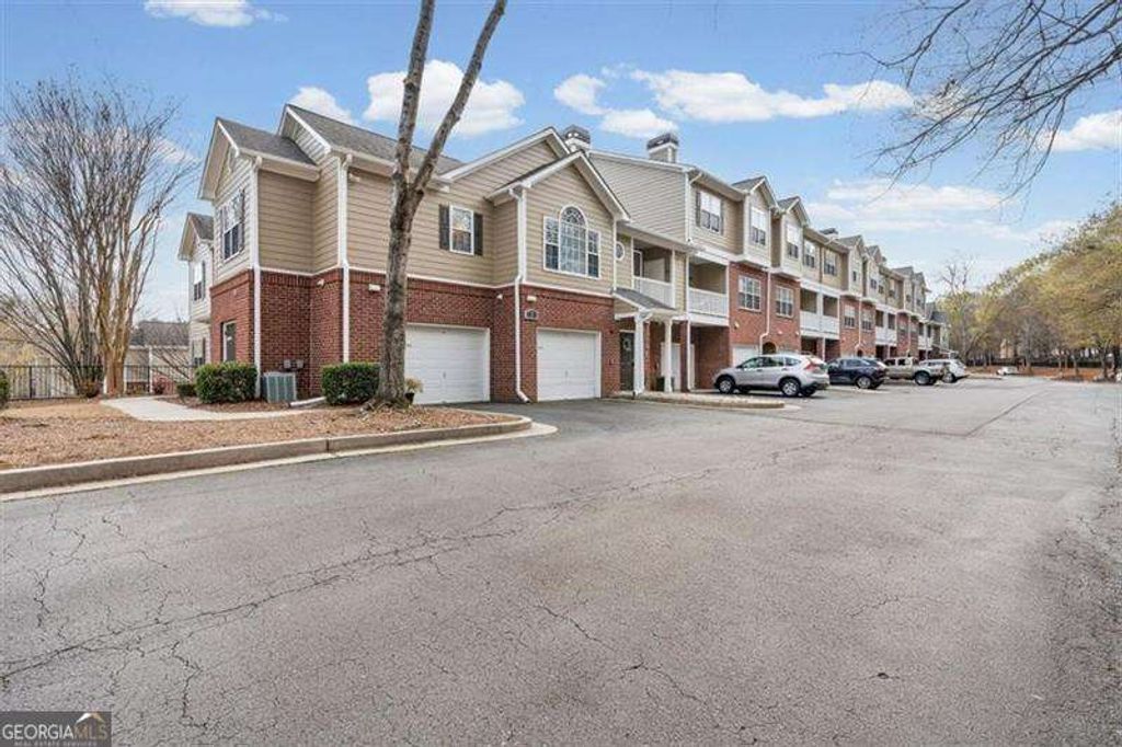 Photo of 7104 Woodland Lane, Alpharetta, GA 30009 (MLS # 10717753)