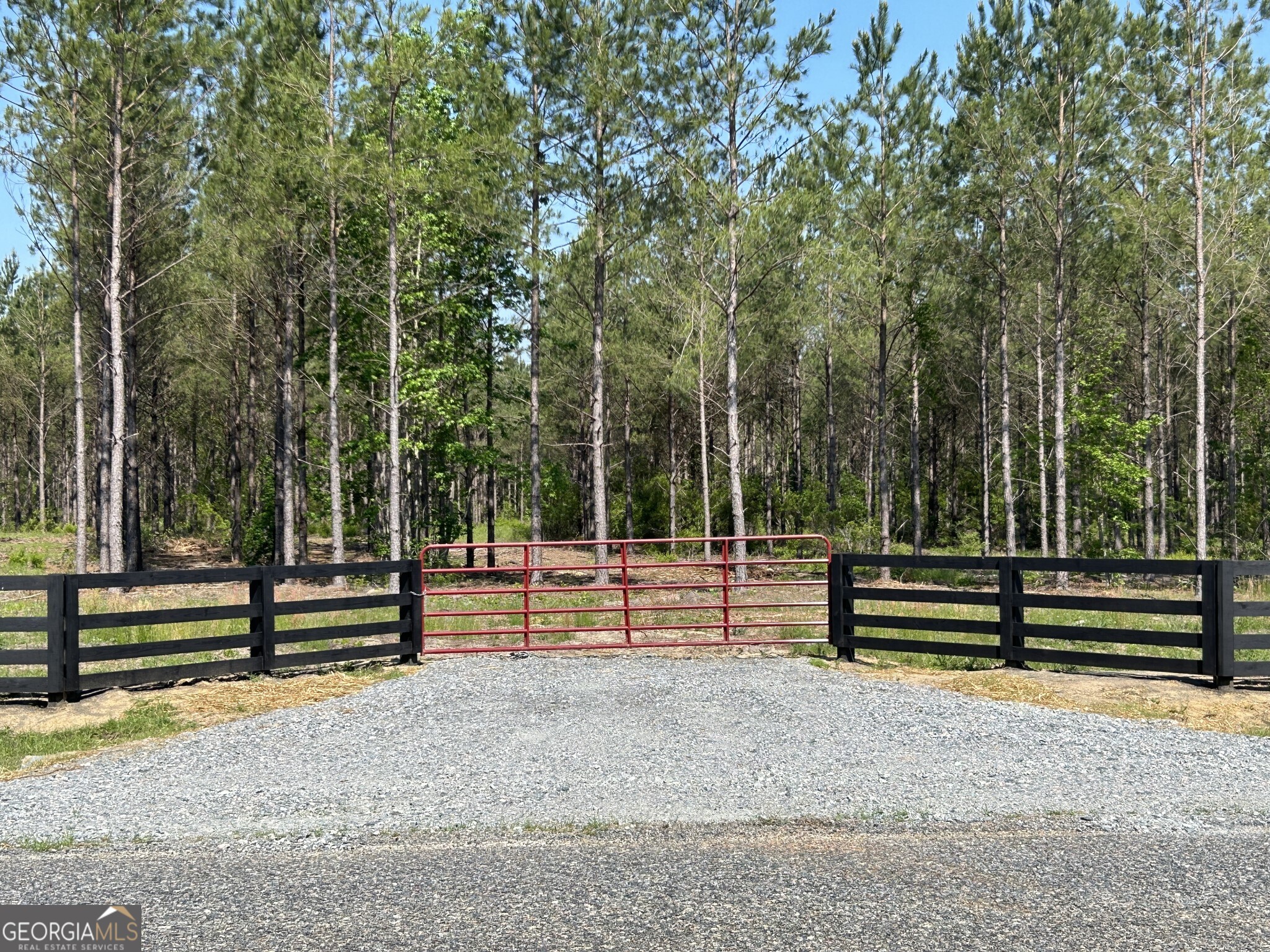 Bluewater offers 19 beautiful country homesites where nature and convenience meet. Lot #9 features 4.438 wooded acres with a small creek along the back property line, providing a quiet and peaceful setting surrounded by natural beauty. The community includes protective covenants, a gated driveway entrance, and paved road frontage, all within an excellent public school district. Just minutes from downtown Dublin and only 6 minutes from Interstate 16, Bluewater is perfectly located halfway between Atlanta and Savannah. With nearby shopping, dining, and entertainment, plus a thriving local economy, this homesite is an excellent opportunity to build your dream home, raise a family, and enjoy the laidback country lifestyle.