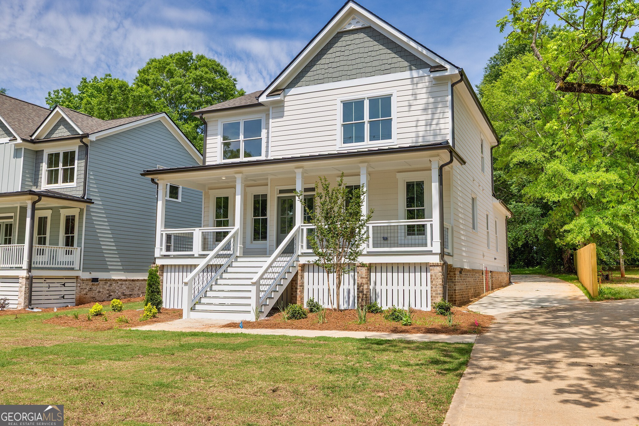The Evergreen Plan by Expo Homes where luxury meets small-town charm in Downtown Monroe! This beautifully crafted custom 4-bedroom, 2.5-bath home is perfectly situated just steps from restaurants, shopping, and entertainment. Enjoy a bright, open-concept layout with a gourmet kitchen featuring custom cabinetry and premium finishes overlooking a spacious family room with a cozy fireplace. The main-level owner's suite offers a large walk-in closet and spa-inspired bath with a custom tile shower. Upstairs features three oversized bedrooms with walk-in closets, a stylish shared bath, and a versatile loft ideal for an office, media space, or playroom. The laundry room is conveniently located on the main level. Outdoor living shines with a covered front porch, private covered back patio, and a rare, oversized backyard. This is a custom home with the option to add a garage or additional living space. Designer finishes, upgraded trim, and thoughtful design throughout. Only two homes available! Quick Move-In ready NOW! Don't miss your opportunity to live in Downtown Monroe!