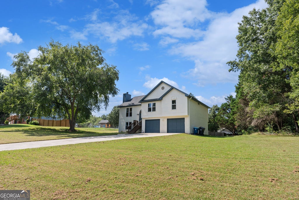 Photo of 4650 Wheeler Creek Dr, Hoschton, GA 30548 (MLS # 10850687)