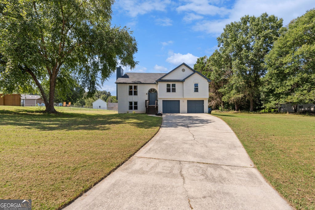 Photo of 4650 Wheeler Creek Dr, Hoschton, GA 30548 (MLS # 10850687)