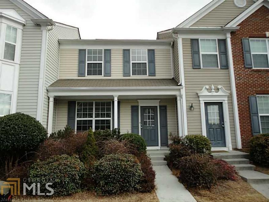Spacious townhome in sought-after Whittington subdivision. Kitchen features all SS Appliances, white kitchen, and tile floors. Kitchen overlooks the great room. Cozy fireplace with stone surround. Roommate floorplan - both bedrooms en suite with walk-in closets. Must See!
