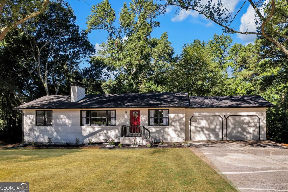 Fully Renovated Brick Ranch with Basement and Timeless Charm! Step into a beautifully updated 4-bedroom, 2-bath ranch home that blends modern upgrades with classic brick architecture. This move-in-ready property offers comfortable one-level living with the added bonus of a finished basement, providing space and flexibility for today's lifestyle. The stunning kitchen features quartz countertops, new appliances, and stylish new fixtures-perfect for home chefs and entertainers alike. Both bathrooms have been thoughtfully renovated, including a brand-new tiled shower in the primary suite. Enjoy new flooring throughout the home, fresh interior and exterior paint, updated plumbing and lighting fixtures, and a new water heater for peace of mind. Cozy up by one of the two fireplaces, one on the main level and one in the spacious bonus room downstairs, ideal for a media room, playroom, or guest suite. The basement also includes generous space for storage or a workshop. With four well-sized bedrooms and a flexible layout, this home adapts to your lifestyle, whether you're working from home or hosting family and friends. Schedule your private tour today and experience all the comfort and convenience this home has to offer!