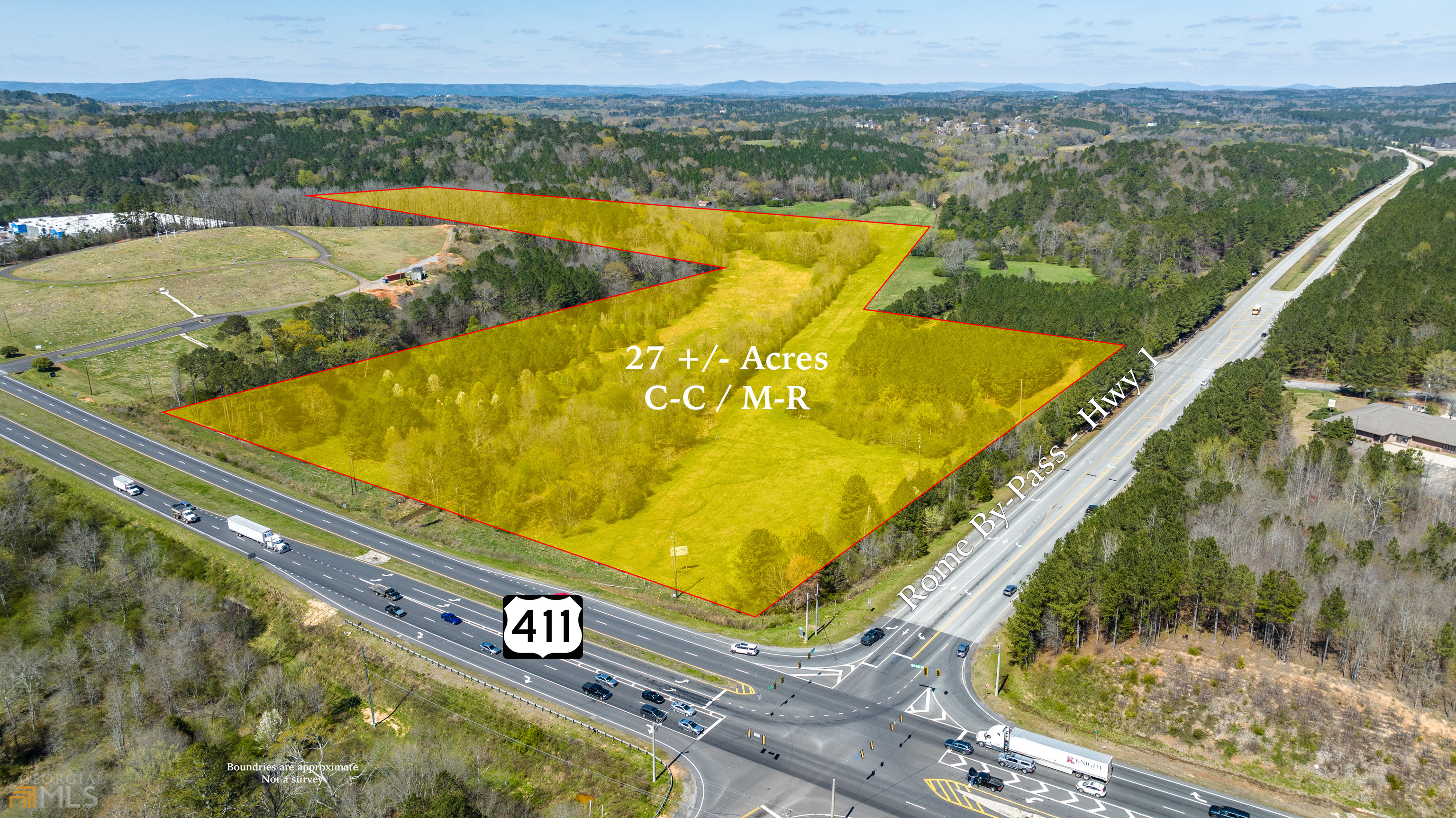 27+/- acreage of prime commercial property.  Currently Zone Multi Family. Could be rezoned Commercial. Prime location at the corner of Hwy 411 and the Rome By Pass (Hwy 1).  Ideal location with high exposure. Acreage amount is flexible and will be determined by survey. $100,000 per ac.