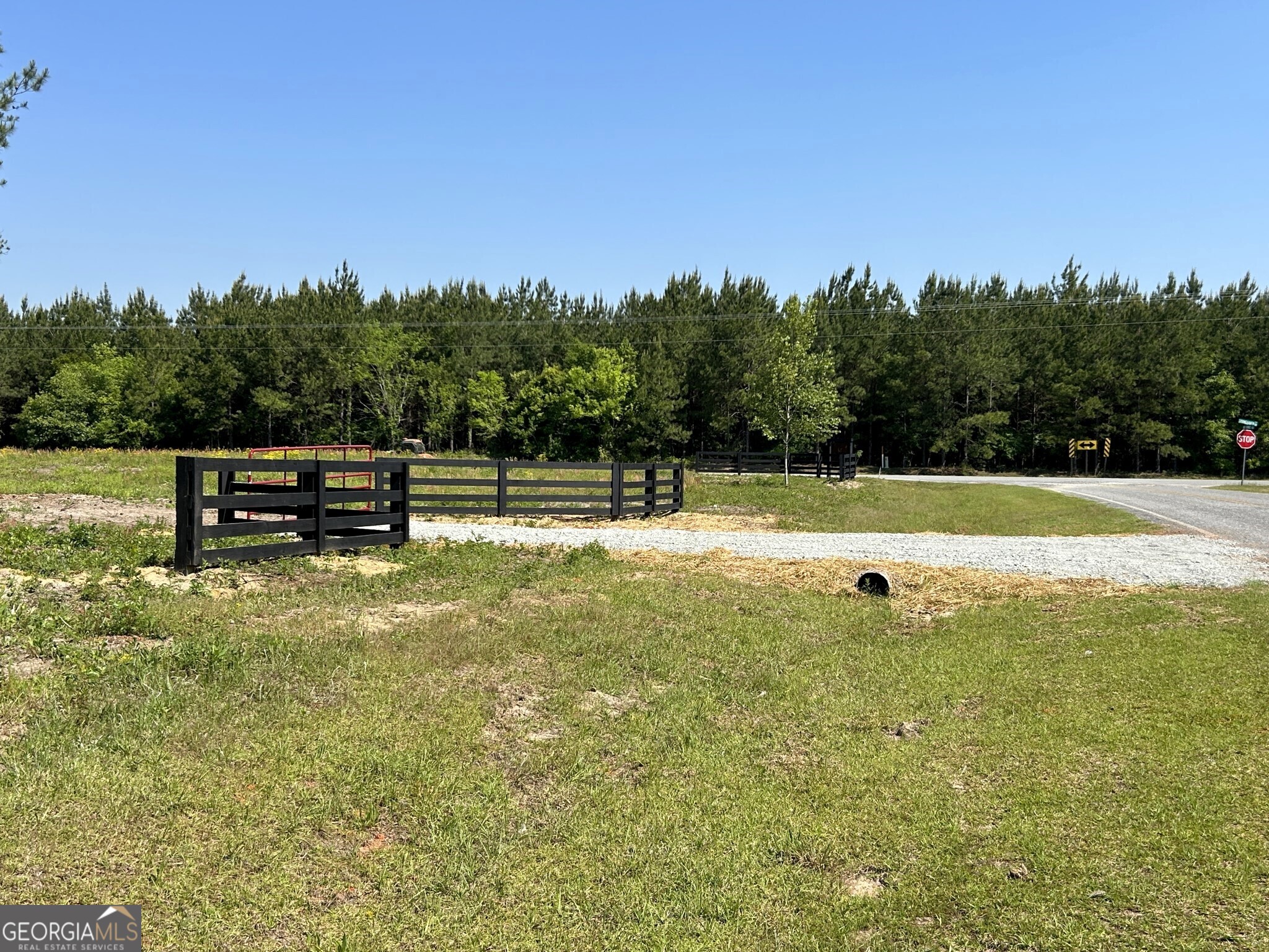 Bluewater features 19 beautiful country homesites, and Lot #15 offers 3.034 wooded acres with a small creek along the back property line. This peaceful, quiet setting lets nature abound in your backyard while providing protective community covenants, a gated driveway entrance, and paved road frontage. Conveniently located just minutes from downtown Dublin, only 6 minutes from Interstate 16, and halfway between Atlanta and Savannah, it offers easy access to shopping, dining, and entertainment. Lot #15 is an ideal opportunity to build your dream home, enjoy the laidback country lifestyle, and raise a family in a thriving, scenic community.