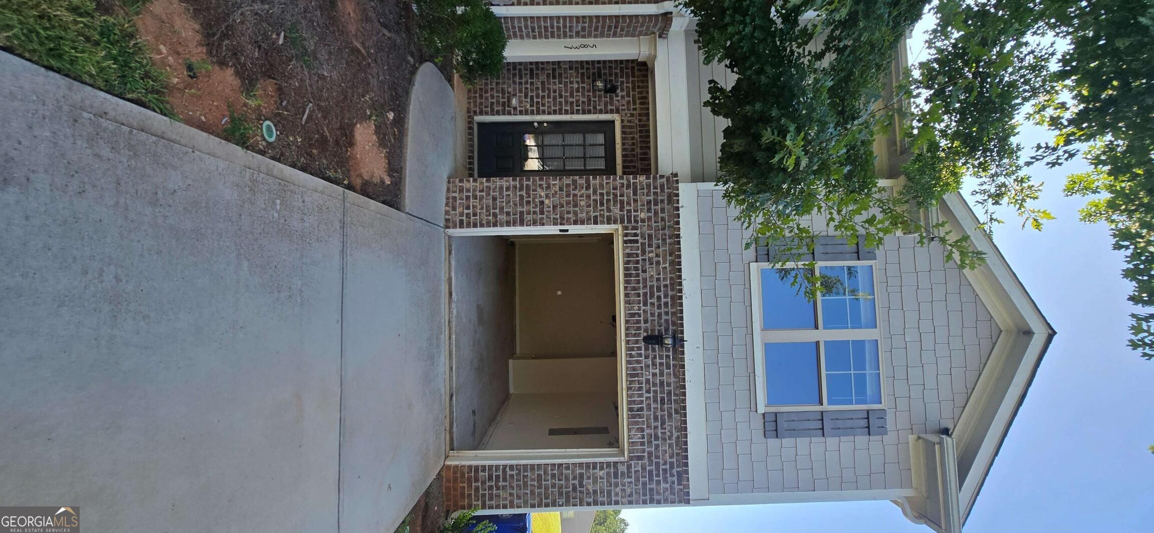 Looking for the perfect rental, look no further! This cozy end unit features 3 bed/3.5 baths, an open concept kitchen/family room combination, LVP flooring, COuntry white cabinetry, granite countertops, and stainless steel appliances. Upstairs, you'll find the primary bedroom with en-suite bathroom, two additional secondary bedrooms and a hall laundry complete with a washer and dryer. The backyard is equipped with a patio, providing the perfect space for outdoor gatherings and entertaining. The property also includes a one-car garage, with additional parking available in the driveway. Situated with close proximity to I-20, I-285, and several local eateries.