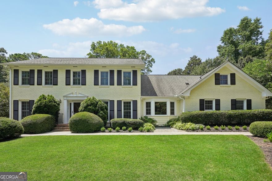 Immaculate outdoor living spaces!!! A gardeners dream home, both front yard and back! Curb appeal off the charts as you drive up to this home. On top of the exterior, you will find a home with double masters and the newest master is on the main. Hardwood floors highlight the man living area along with an open floorplan and a vaulted sunroom that will want you to hang out in all day. The beautiful kitchen features white cabinetry and an eat-in area and a separate dining room. Two sets of stairs will lead you upstairs to the four bedrooms and three full bathrooms. The second master has a walk-in closet and an updated bath. The Bonus room can act as a bedroom, an office or a playroom and has its own full bath. The basement is mostly finished with some unfinished area for the systems and storage. Outside the very private fenced in backyard beckons with its level lot, stone patio, charming fishpond and covered grilling area, providing an idyllic setting for outdoor entertaining or relaxation. Fenhurst is a highly desirable cul-de-sac just walking distance to Brooke Run park and a short drive to the Perimeter Business District and 285.