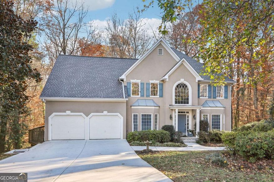 Escape to your own private oasis in this exquisite home nestled on a peaceful cul-de-sac in one of the area's most sought-after neighborhoods. Mature landscaping welcomes you as you approach the home, hinting at the beauty within. Step inside and be greeted by a grand two-story foyer bathed in natural light streaming through a transom window. To the left, a formal dining room with elegant chair railing awaits, ready to host unforgettable gatherings of up to 12 guests. On the right, discover a versatile space perfect for a formal living room, home office, or cozy library. The heart of this home is undoubtedly the chef-inspired kitchen. Boasting custom-painted cabinetry, gleaming quartz countertops, stainless steel appliances, and a stylish tile backsplash, it's a haven for culinary creativity. Imagine preparing gourmet meals while enjoying conversation with loved ones gathered around the breakfast bar. The adjacent breakfast area seamlessly flows onto an expansive deck, an ideal setting for morning coffee, al fresco dining, or simply unwinding while surrounded by the sights and sounds of nature. A convenient half bath and laundry room complete this level. Upstairs, retreat to the luxurious primary suite, a true sanctuary. A tray ceiling adds architectural interest, while the spa-like en-suite bath promises relaxation and rejuvenation. Indulge in the dual vanities, illuminated LED mirrors, a fully tiled frameless glass shower, and a breathtaking black pedestal soaking tub. The huge walk-in closet with his-and-hers sides and custom built-ins provides ample space for your wardrobe. Two generously sized secondary bedrooms share a Jack-and-Jill bath, while a third bedroom enjoys a private en-suite bath and large walk-in closet. A fifth bedroom offers a cozy cove perfect for a reading nook or study area, along with direct access to a private staircase.  The finished basement presents endless possibilities. Create a guest suite, in-law apartment, home gym, or entertainment haven. A bedroom with a spacious closet, a convenient kitchenette, and a covered screened porch where you can enjoy sounds of the creek provide comfort and flexibility. A media room sets the stage for movie nights and family gatherings. Outside, discover your own private retreat where you can enjoy local wildlife including deer. Half an acre of land invites outdoor enjoyment. Gather with friends and family under the pavilion, complete with a shuffleboard court and built-in bar. This exceptional property offers the perfect blend of luxury, comfort, and privacy. Don't miss the chance to make this dream home your own! Schedule your private showing today and experience the magic for yourself. Rate incentive with preferred lender on this listing!