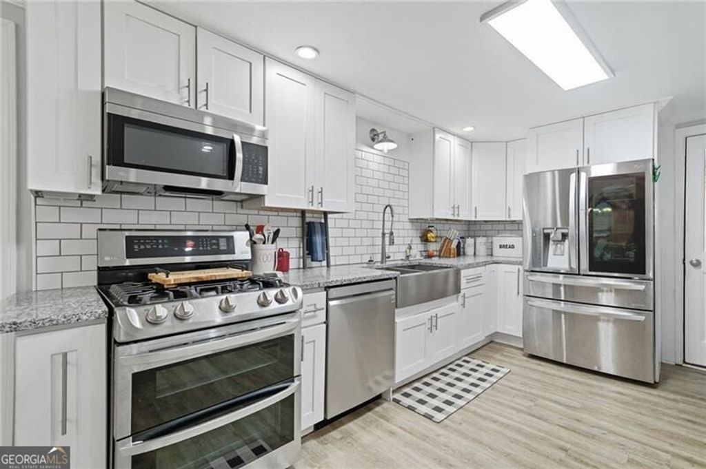 Photo of 238 Trinity Church Road, Canton, GA 30115 (MLS # 10720374)