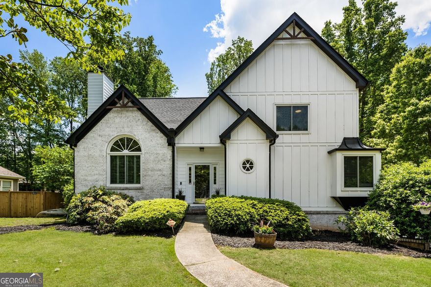 Charming, Fully Renovated Home Just Steps from Downtown Alpharetta! Welcome to 5600 Surrey Court, a beautifully updated gem nestled on a quiet cul-de-sac in the heart of Alpharetta, GA. With modern upgrades throughout and a walkable location to one of North Georgia's most vibrant downtowns, this home offers the perfect blend of comfort, convenience, and character. Boasting a brand-new roof, windows, HVAC, siding, and a whole-house water filtration system, this home is move-in ready and built to last. The primary suite on the main level provides unmatched comfort, while new hardwood floors, remodeled bathrooms, and modern lighting add a luxurious touch throughout. Step inside to a vaulted family room with a cozy fireplace, ideal for relaxing evenings or hosting friends. A flexible bonus space nearby can be used as an office, playroom, or den -tailored to fit your lifestyle. The updated kitchen features brand-new appliances and a sunny eat-in area, leading into a sunroom flooded with natural light - a perfect spot for morning coffee or quiet reading. From here, step out onto the spacious back deck that overlooks a fully fenced, flat backyard, ideal for pets, play, or peaceful outdoor living. Nature lovers will appreciate the large organic garden, established areas for grapes, elderberries, and wild blackberries, and a cozy firepit gathering area - your private oasis to enjoy Georgia's stunning sunrises and star-filled nights. But the location is what truly sets this home apart: Just a short stroll to Downtown Alpharetta, you'll enjoy live concerts, weekend festivals, boutique shops, and some of the city's best restaurants and food trucks-all without needing to drive. Walk to the farmers market, or catch an outdoor show just minutes from your front door! Additional features include: newly remodeled luxury primary bath, separate storage shed for tools and gear, unfinished basement with high ceilings and tons of potential, and flat lot perfect for a future carriage house or detached garage, This is your chance to own a home that offers both serenity and connection, style and substance - all in one of Alpharetta's most desirable locations. Don't miss out - schedule your private tour today and experience life at 5600 Surrey Court!