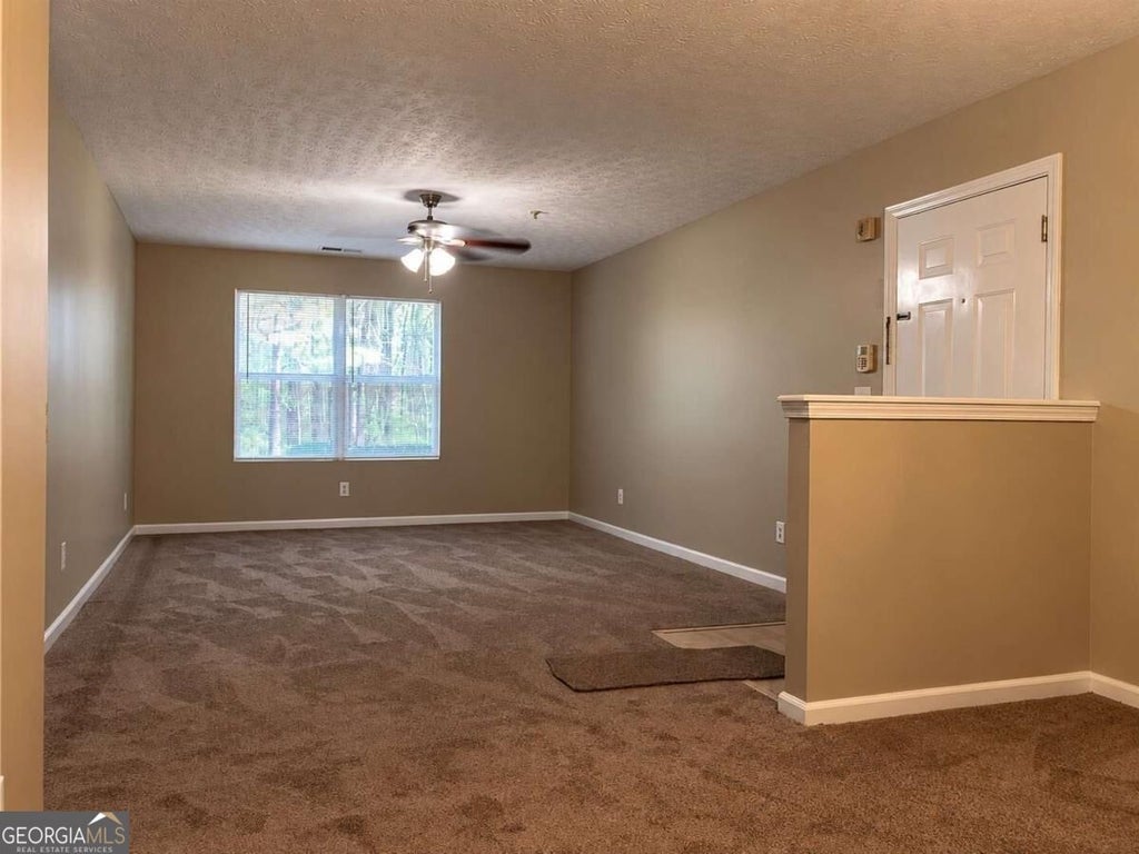 Photo of 4103 Par Three Way, Lithonia, GA 30038 (MLS # 10874956)