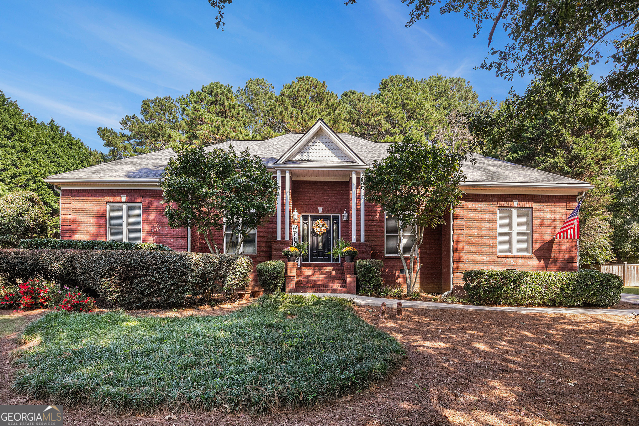 Stately All-Brick Ranch on One Acre in Exclusive Wellington Community Welcome home to 615 Wellington Drive a beautifully maintained, custom-built, all-brick ranch that exudes timeless elegance and superior craftsmanship. Perfectly positioned on a picturesque 1-acre lot in one of Winder's most sought-after communities, this home offers the ideal blend of space, comfort, and refined living. Step inside to find four spacious bedrooms and 2.5 baths, thoughtfully designed for both family living and effortless entertaining. The large kitchen is the heart of the home perfect for preparing meals and gathering with loved ones. The owner's suite is a true retreat, featuring a luxurious jetted soaking tub, separate shower, and plenty of space to unwind. Outdoor living is just as inviting, with a covered back porch ideal for relaxing evenings and a fenced backyard offering privacy, security, and room to play. A two-car, side-entry garage adds convenience and curb appeal. Located in an established, exclusive neighborhood of custom-built homes, this property boasts charming sidewalk-lined streets and access to a community tennis and pickleball court perfect for active lifestyles and neighborhood gatherings. If you're seeking a stately, single-level home with classic character and modern comfort, 615 Wellington Drive is a rare find. Schedule your private tour today and experience the exceptional lifestyle this home has to offer.