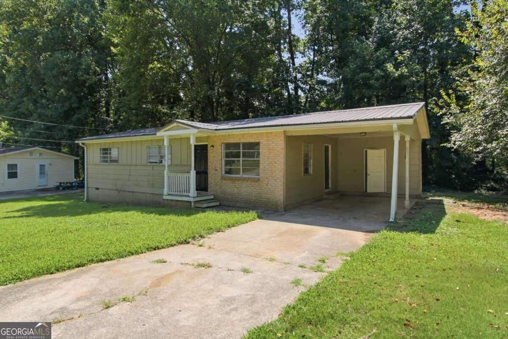 Photo of 10146 Morris Drive SW, Covington, GA 30014 (MLS # 10834440)
