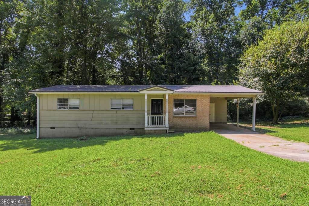 Photo of 10146 Morris Drive SW, Covington, GA 30014 (MLS # 10834440)