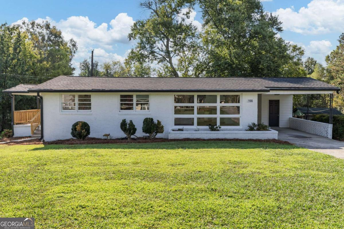 Welcome to 156 McGrady Rd, a beautifully updated home tucked away on a large lot that offers the perfect balance of peace and convenience. With plenty of room to spread out, you'll enjoy the feel of country living while still being just minutes from town. Inside, the home has been thoughtfully refreshed from top to bottom. Fresh paint, new flooring, and stylish fixtures create a modern yet comfortable feel. The kitchen features newer appliances ready for your favorite meals, while major improvements like all new plumbing and a recently replaced roof provide lasting peace of mind. Every detail has been considered, making this home truly move-in ready. Step outside and the property really shines. The spacious lot is perfect for gardening, outdoor gatherings, or simply relaxing in your own private retreat. The detached barn adds endless possibilities-whether you need extra storage, a workshop, or space for your hobbies. With its combination of thoughtful updates, open space, and inviting character, 156 McGrady Rd is more than a house-it's a place to put down roots and enjoy the best of both worlds. Schedule your showing today and see why this property is so special.