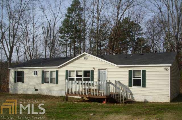 Private lot: 3 Bedroom, 2 Bath 2003 mobile home on 5 acres. Needs TLC. Sold as is, no disclosures, no repair. Owner financing may be possible. Please call for more information. *Driveway is better suited for a truck or park on the road and short walk to mobile unit.